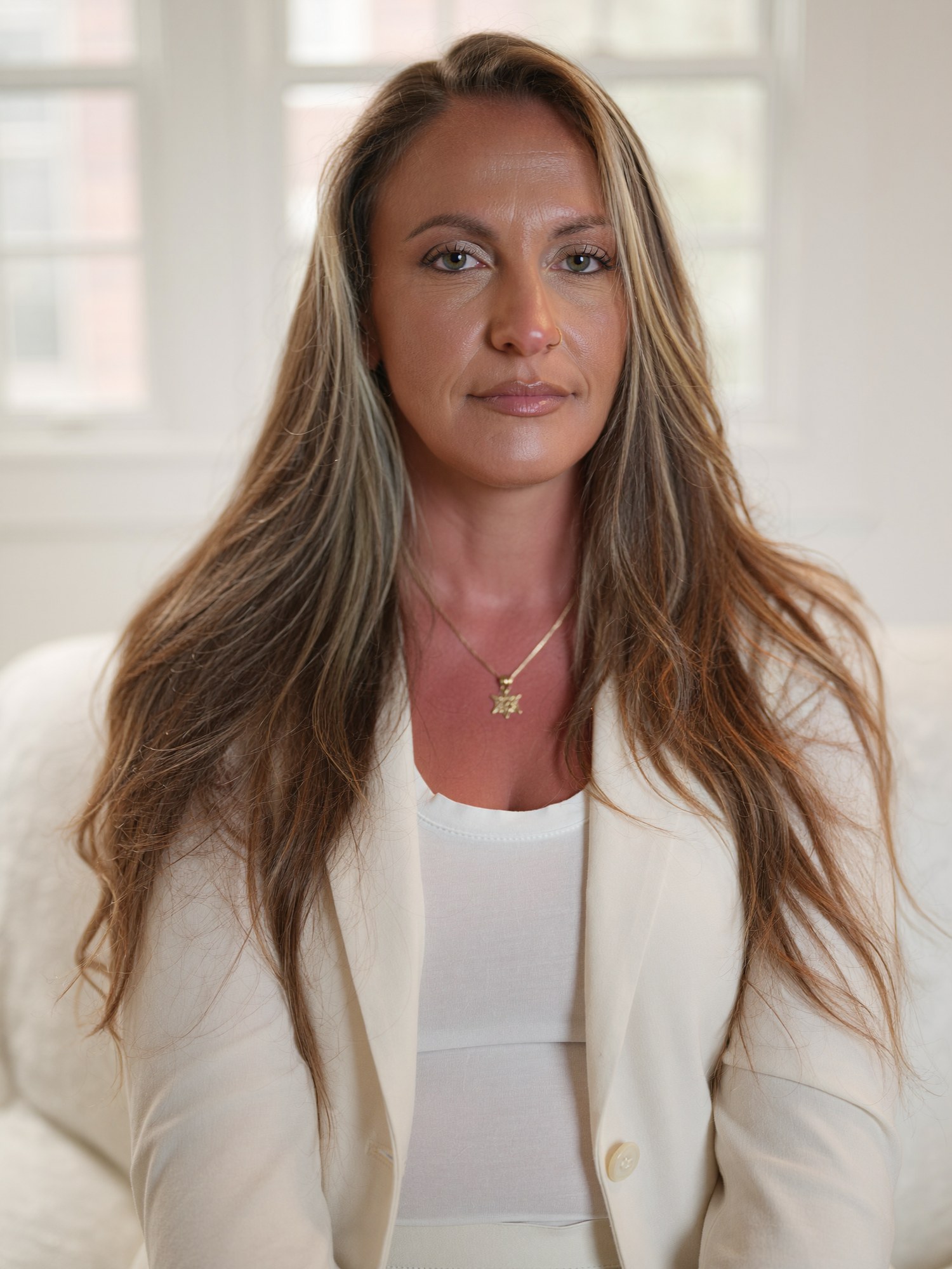 Vlada reviewing a client system at her desk